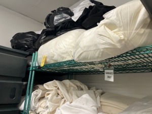 LOT DIRTY LAUNDRY - CONTENTS OF 2 METRO RACKS & BEHIND DRYER & MOP HEADS