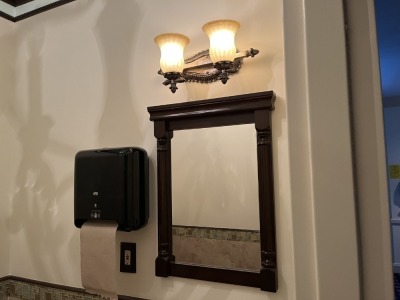 LOT CONTENTS OF 2 BATHROOMS - SCONCES, CHANDELIERS, MIRRORS, SMALL TABLES, ETC ***BUYER MUST CAP ELECTRIC***