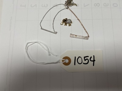 ASSORTED JEWELRY - 1- GOLD TONE NECKLACE / 1- SILVER TONE NECKLACE / 1- GOLD TONE ELEPHANT WITH STONES ***LOCATED IN DAVIE, FL***