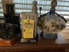 ASSORTED TABLE DECOR - 1- FLASK / 4- LIQUOR DECANTERS / 1- LOT OF GUN POWDER CANS / 1- INDIAN SQUAW WITH PAPOOSE - 2