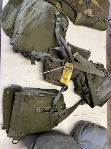 ASSORTED GAS MASKS IN CANVAS BAGS