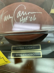 FOOTBALL IN CASE - SIGNED HARRY CARSON