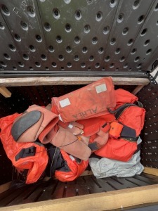 ASSORTED PIECES - 4- SUITS / 1- LARGE WATERPROOF BAG