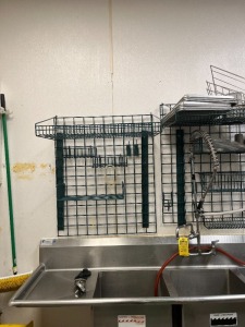 GREEN WALL RACKS (ATTACHED TO WALL) (LOCATED IN OKEECHOBEE, FL - #34767)