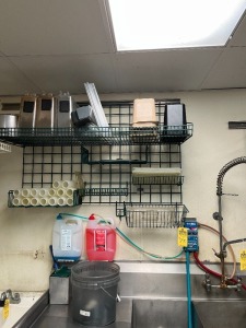 GREEN WALL MOUNTED RACKS (LOCATED IN OKEECHOBEE, FL - #7007)