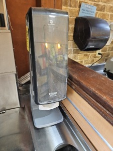 NAPKIN DISPENSER (LOCATED IN CUTLER BAY, FL)