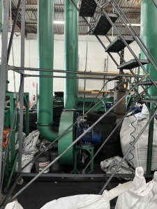LOT TIRE SHREDDING MACHINE - MADE IN AUSTRIA - MAKES APPROXIMATELY 1/2 TON PER HOUR OF RUBBER CRUMB - TAKES 1/4 TIRES - SOFT START 1- SHEAR MACHINE - 1- SHREDDING MACHINE WITH MAGNETIC CONVEYOR - 2- SCREENING MACHINES (MAKES 3 SIZES) - 2- CONTROL SYSTEMS 