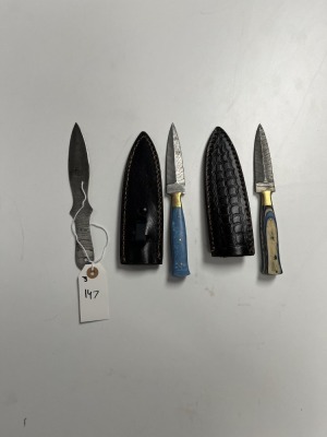 ASSORTED - 1- DAGGER - RESIN HANDLE - LAMINATED LEATHER SHEATH / 1- DAGGER - PAKKA WOOD HANDLE - LAMINATED LEATHER SHEATH / 1- BLANK BLADE - CUSTOM HANDMADE DAMASCUS STEEL