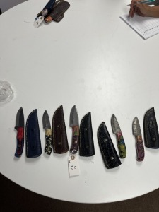 ASSORTED SKINNING KNIVES - 4- RESIN HANDLE / 1- PAKKA WOOD HANDLE - CUSTOM HANDMADE DAMASCUS STEEL - LAMINATED LEATHER SHEATH