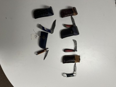 ASSORTED POCKET KNIVES - 3- RESIN HANDLE / 1- PAKKA WOOD HANDLE / 1- HAWKBILL PRUNING POCKET KNIFE - CUSTOM HANDMADE DAMASCUS STEEL - LAMINATED LEATHER SHEATH