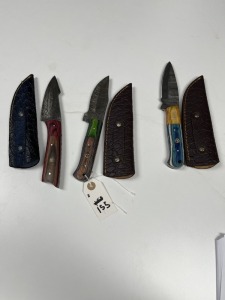 ASSORTED SKINNING KNIVES - CUSTOM HANDMADE DAMASCUS STEEL - PAKKA WOOD HANDLE - LAMINATED LEATHER SHEATH (RED HANDLE HAS SMALL FLAW)