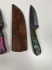ASSORTED SKINNING KNIVES - 3- RESIN HANDLE / 2- PAKKA WOOD HANDLE - CUSTOM HANDMADE DAMASCUS STEEL - LAMINATED LEATHER SHEATH - 8