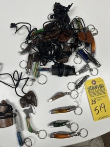 ASSORTED KEYCHAINS / NECKLACES WITH POCKET KNIVES, AXES, KNIVES & MORE