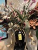 BLACK VASE WITH ARTIFICIAL FLOWERS