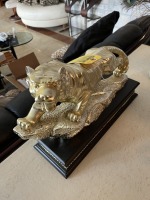 GOLD-TONE LION ON BLACK BASE