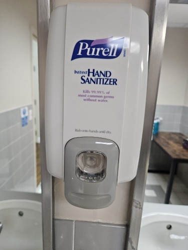WALL MOUNTED DISPENSERS - 1- PURELL HAND SANITIZER / 1- LOCOR MOTION PAPER TOWEL