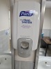 WALL MOUNTED DISPENSERS - 1- PURELL HAND SANITIZER / 1- LOCOR MOTION PAPER TOWEL