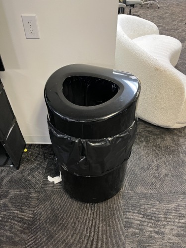 BLACK TRASH RECEPTACLE