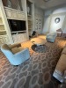 ASSORTED PIECES - 1- ROUND COFFEE TABLE - 42'' DIAMETER / 2- BLUE & BROWN FABRIC CLUB CHAIRS