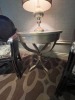 ASSORTED - 2- CANE BACK DINING ARM CHAIRS / 1- SILVER LAMP WITH TAUPE SHADE / 1- ROUND SILVER SIDE TABLE - 22'' DIAMETER - 3