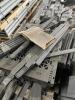 PALLETS & PILES OF ASSORTED GRAY SHELVING PARTS - 7