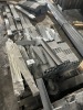 PALLETS & PILES OF ASSORTED GRAY SHELVING PARTS - 8