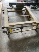 YELLOW ACCORDION LIFT ON WHEELS