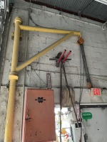 HOIST ON METAL STAND (BOLTED TO WALL)