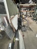 LOT ASSORTED - BALANCE OF FLOOR LEVEL NOT LOTTED - LARGE QUANTITY METAL / STEEL / ALUMINUM, CAR PARTS, GEARS, CHAINS, HOMEMADE SPRAY BOOTH STANDS, HOODS, EXHAUST, DOORS, ETC - 5