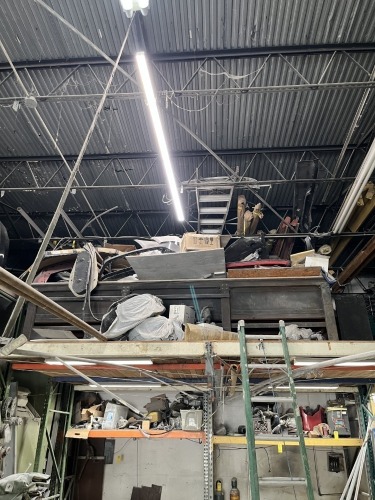 LOT ASSORTED - BACK LOFT SECTION - 18' METAL TABLE, ALUMINUM LADDER, GENERATOR, AUTOMOTIVE DOORS, METAL BEAMS, TABLE FOR TABLE SAW, CAR PARTS, BUMPERS, LIGHTS, METAL RACKS, PRESSURE WASHER, FAN, HOISTS, TOOL BOX, TIRES, ETC ***MUST HAVE FORKLIFT***