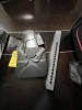 ASSORTED PIECES - 1- NETGEAR SWITCH / 1- TP LINK ROUTER