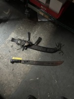 MACHETE WITH DECORATED LEATHER SHEATH