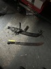 MACHETE WITH DECORATED LEATHER SHEATH