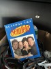 LOT ASSORTED - HATS, SEINFELD DVD's, BANDAIDS, JUMPER CABLES, ETC (1 BOX) - 2