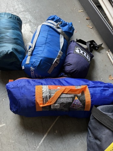 ASSORTED - 1- FIELD & STREAM PILLOW IN BAG / 1- MORMOT SLEEPING BAG / 2- NYLON HAMMOCKS / 1- 5'x5' KIDS TEEPU IN BAG / 2- LIGHT WEIGHT SLEEPING BAGS IN BAG