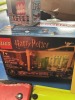 ASSORTED TOYS - 1- STAR WARS PUZZLE / 1- HESS TRUCK (DAMAGED) / 1- HARRY POTTER LEGO / 1- CHATTERING TEETH - 2