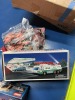 ASSORTED TOYS - 1- STAR WARS PUZZLE / 1- HESS TRUCK (DAMAGED) / 1- HARRY POTTER LEGO / 1- CHATTERING TEETH - 4