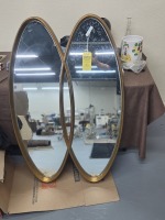 Pair of Mid-Century Modern Oval Brass Framed Wall Mirrors