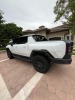 2025 GMC HUMMER EV 3X - VIN #1GT40DDBXSU119643 - White Exterior - Electric Vehicle - 4 Door Crew Cab - Leather Interior - Heated Seats - Rear A/C - Keyless Entry - Sun Roof - Navigation System - Bed Liner - Bed Cover - 20,786 Miles on Odometer - (Located - 4