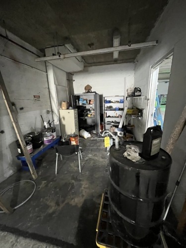 LOT CONTENTS OF ROOM - BARREL PUMPS, CHAIN, CABINET, TAPCON SCREWS, ETC