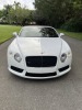2014 BENTLEY CONTINENTAL GT CONVERTIBLE - VIN #SCBGT3ZA7EC092204 - WHITE EXTERIOR - AUTOMATIC TRANSMISSION - V8 ENGINE - LEATHER INTERIOR - NAVIGATION SYSTEM - HEATED SEATS - KEYLESS ENTRY - 19,716 MILES ON ODOMETER (2 SMALL HOLES IN CONVERTIBLE TOP)