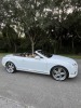 2014 BENTLEY CONTINENTAL GT CONVERTIBLE - VIN #SCBGT3ZA7EC092204 - WHITE EXTERIOR - AUTOMATIC TRANSMISSION - V8 ENGINE - LEATHER INTERIOR - NAVIGATION SYSTEM - HEATED SEATS - KEYLESS ENTRY - 19,716 MILES ON ODOMETER (2 SMALL HOLES IN CONVERTIBLE TOP) - 13