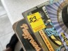 ASSORTED PIECES - 1- CONEY ISLAND SIGN (IN ORIGINAL PLASTIC WRAP) / 1- BATMAN SIGN (IN ORIGINAL PLASTIC WRAP) / 1- SET OF BATMAN COASTERS (NEW IN BOX) - 2